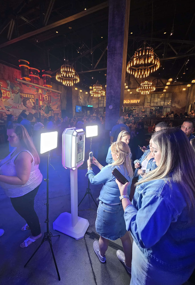Guests reviewing their DSLR photo