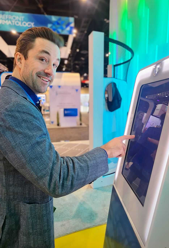 Guests reviewing their kiosk photo