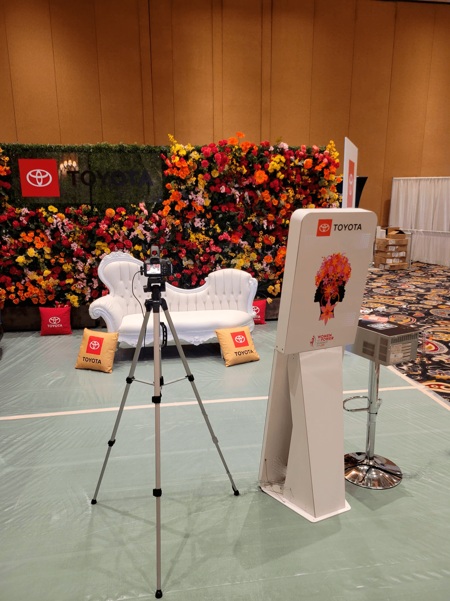Toyota flower wall photo booth setup