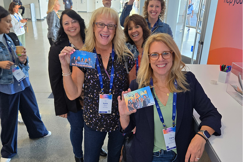 Group holding their personalized postcards