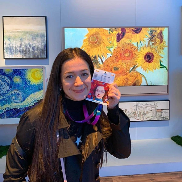 Guest with her custom sticker in the gallery