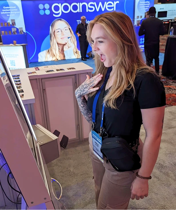Guest using a Keshot kiosk at an event